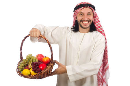 Arab man with fruits isolated on whiteの写真素材