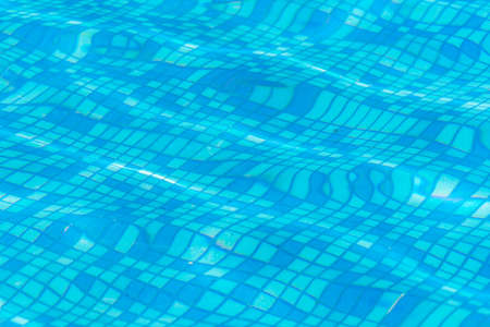 Texture of blue water in the pool