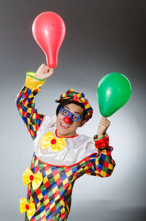 Clown with balloons in funny conceptの写真素材