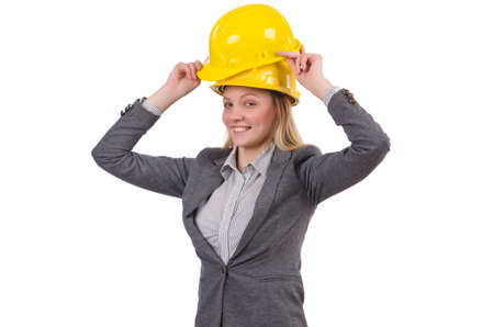 Businesswoman in gray suit and safety helmet isolated on whiteの写真素材