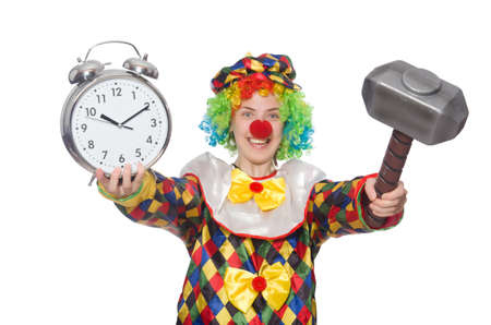 Clown with clock and hammer isolated on whiteの写真素材