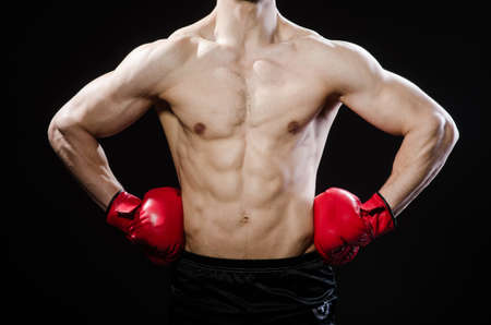 Muscular man in boxing conceptの写真素材