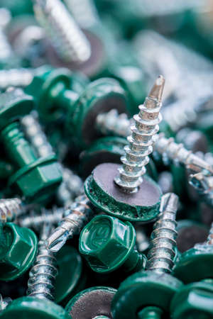 Many screws arranged as backgroundの写真素材