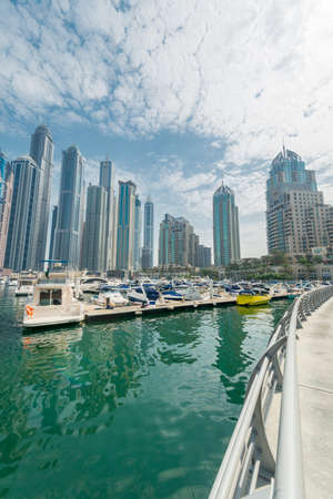 Dubai - AUGUST 9, 2014: Dubai Marina district on August 9 in UAE. Dubai is fastly developing city in Middle Eastのeditorial素材