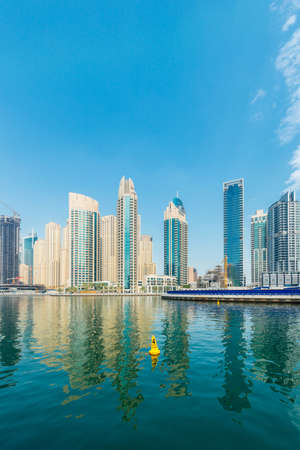 Dubai - AUGUST 9, 2014: Dubai Marina district on August 9 in UAE. Dubai is fastly developing city in Middle Eastのeditorial素材