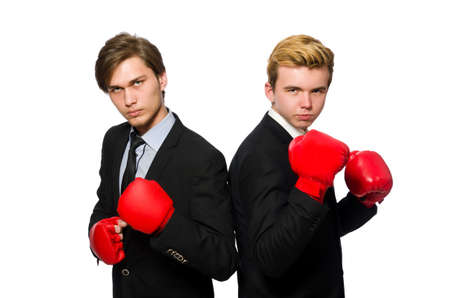Pair of businessmen boxing on whiteの写真素材