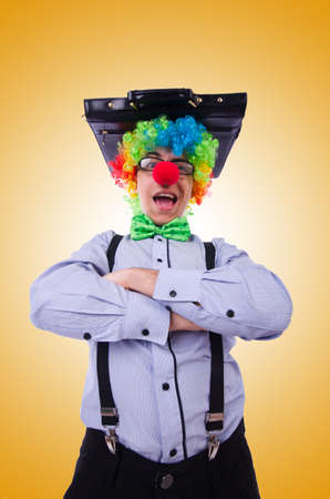 Clown businessman isolated on whiteの写真素材