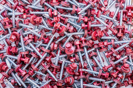 Many screws arranged as backgroundの写真素材