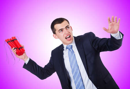 Businessman with dynamite isolated on whiteの写真素材