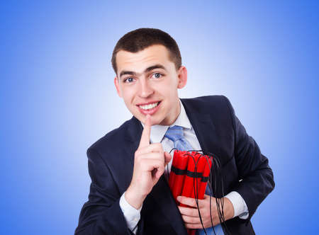 Businessman with dynamite isolated on white