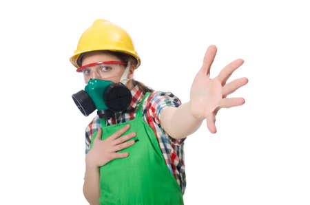 Female worker wearing coverall and gas mask isolated on whiteの写真素材