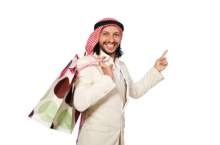 Arab man with shopping bags on whiteの写真素材