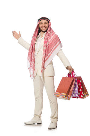 Arab man with shopping bags on whiteの写真素材