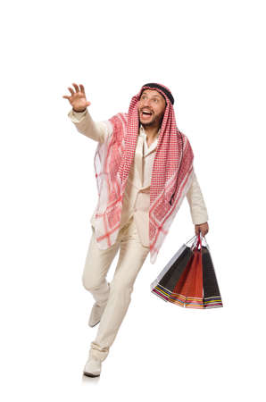 Arab man with shopping bags on whiteの写真素材