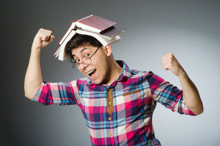 Funny student with many books