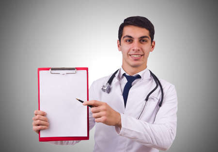 Male doctor isolated on the whiteの写真素材