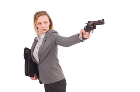 Pretty employee with handgun isolated on whiteの写真素材