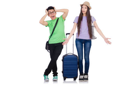 Girl and boy with suitcase isolated on whiteの写真素材