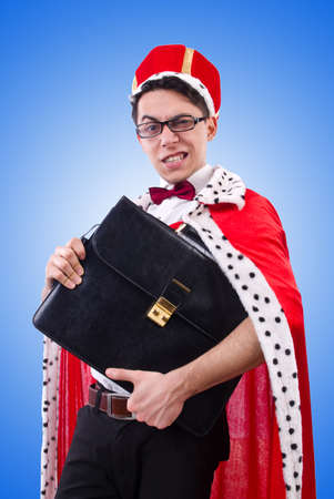King businessman isolated on whiteの写真素材