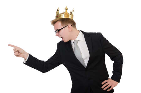 Young businessman with crown isolated on whiteの写真素材