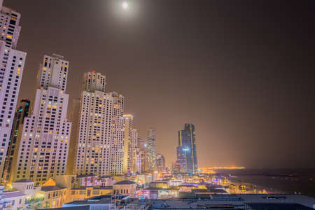 Dubai - AUGUST 9, 2014: Dubai Marina district on August 9 in UAE. Dubai is fastly developing city in Middle Eastのeditorial素材
