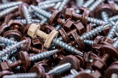 Many screws arranged as backgroundの写真素材