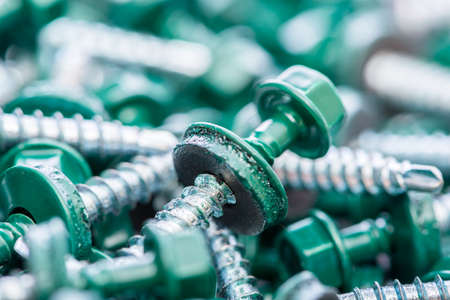 Many screws arranged as backgroundの写真素材