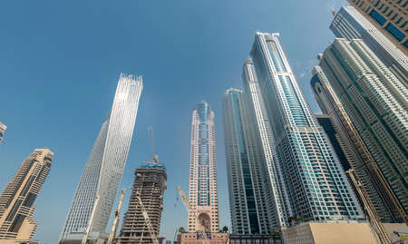 Dubai - AUGUST 9, 2014: Dubai Marina district on August 9 in UAE. Dubai is fastly developing city in...