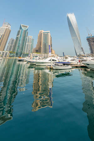 Dubai - AUGUST 9, 2014: Dubai Marina district on August 9 in UAE. Dubai is fastly developing city in Middle Eastのeditorial素材