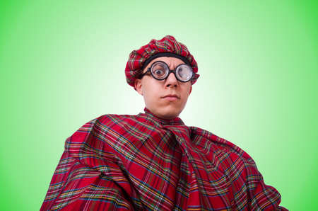 Funny scotsman isolated on the whiteの写真素材