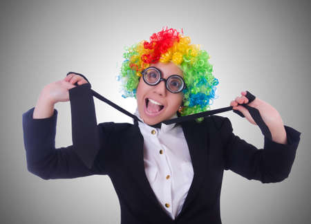 Woman clown businesswoman isolated on whiteの写真素材