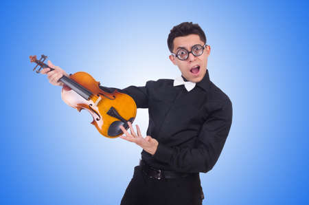 Funny violin player on whiteの写真素材