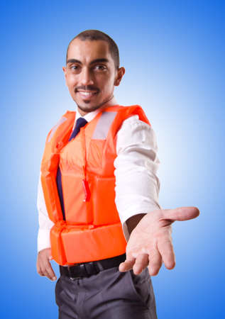 Man in life jacket isolated on whiteの写真素材