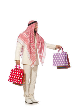 Arab man with shopping bags on whiteの写真素材