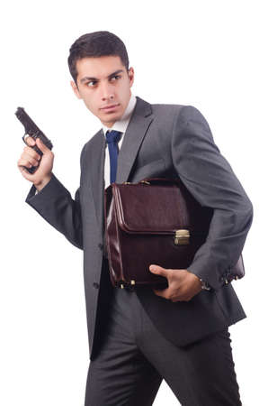 Businessman with gun isolated on whiteの写真素材