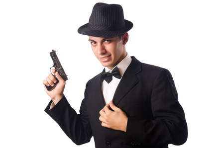 Young elegant man holding handgun isolated on whiteの写真素材