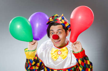 Clown with balloons in funny conceptの写真素材