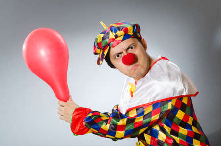 Clown with balloons in funny conceptの写真素材