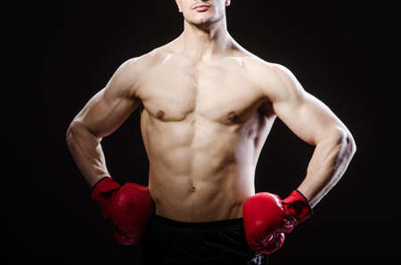 Muscular man in boxing conceptの写真素材