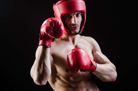Muscular man in boxing conceptの写真素材