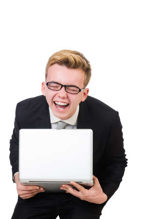 Young businessman with laptop isolated on whiteの写真素材