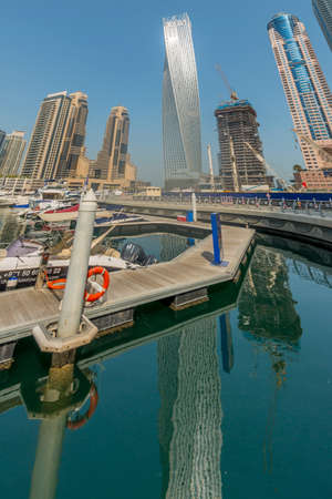 Dubai - AUGUST 9, 2014: Dubai Marina district on August 9 in UAE. Dubai is fastly developing city in Middle Eastのeditorial素材