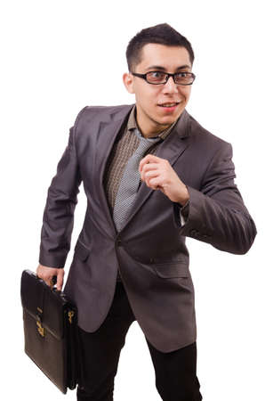Young man holding briefcase isolated on whiteの写真素材