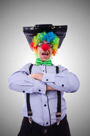 Clown businessman isolated on whiteの写真素材