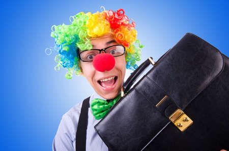 Clown businessman isolated on whiteの写真素材
