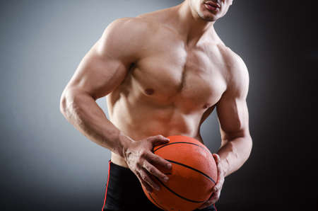 Muscular basketball in sports conceptの写真素材