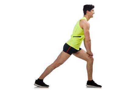 Young man exercising on whiteの写真素材