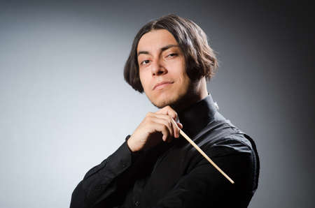 Funny conductor in musical conceptの写真素材