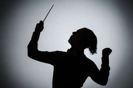 Funny conductor in musical conceptの写真素材