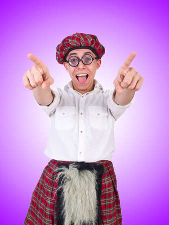 Funny scotsman isolated on the whiteの写真素材